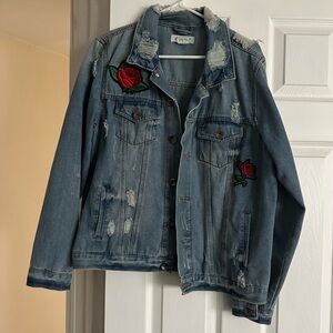 Jean jacket with roses on it